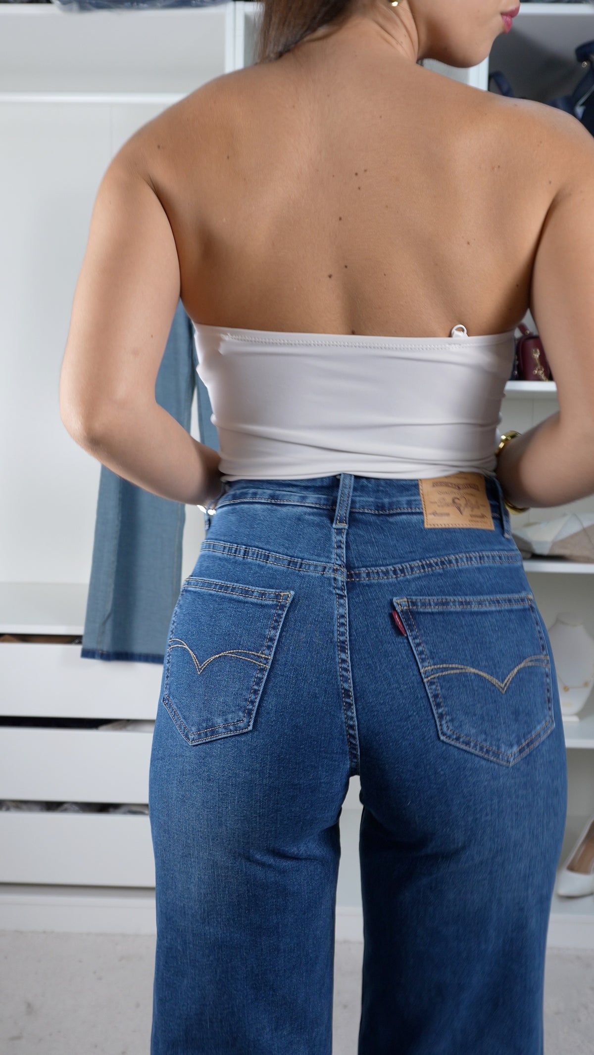 Calças de ganga com cinta compressora modeladora