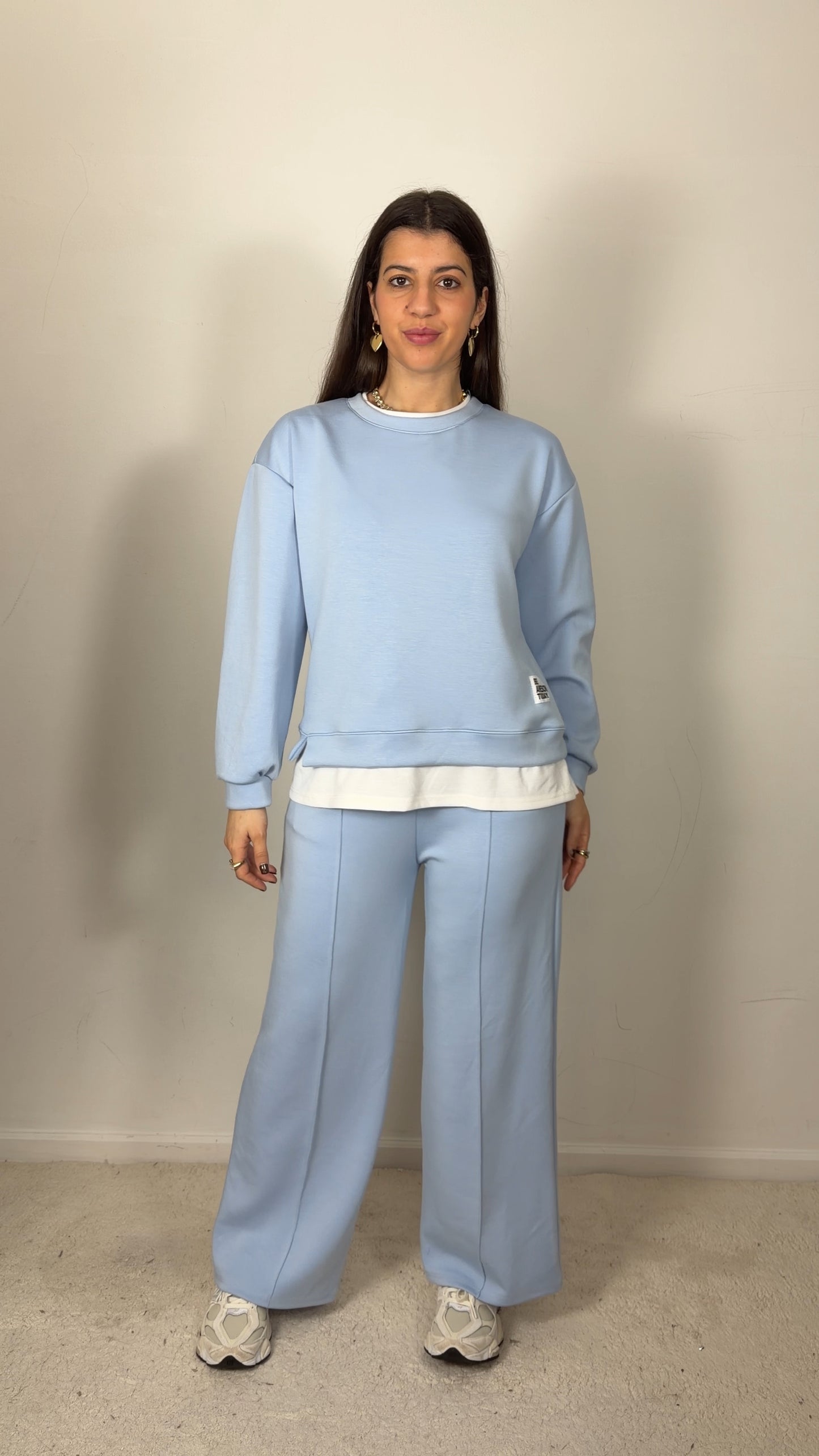 Conjunto fato de treino