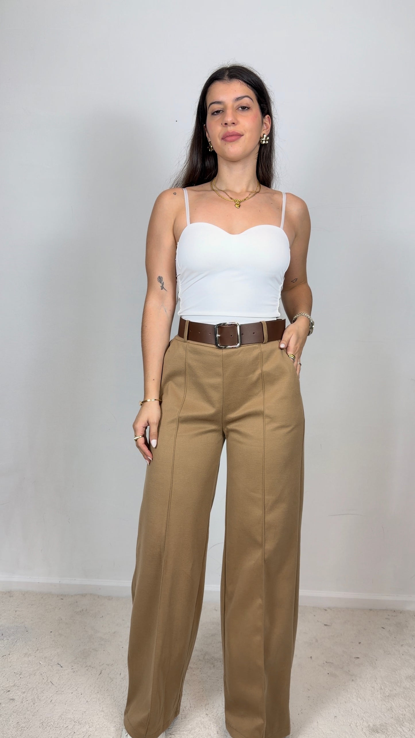 Calças em fazenda macia