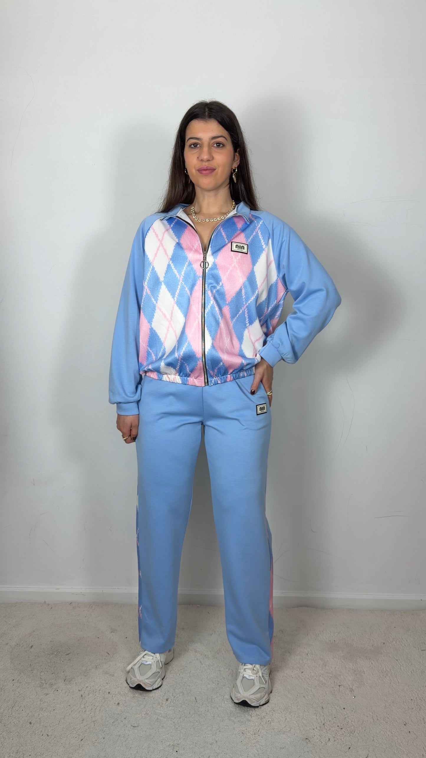 Conjunto fato de treino c/padrão de losangos