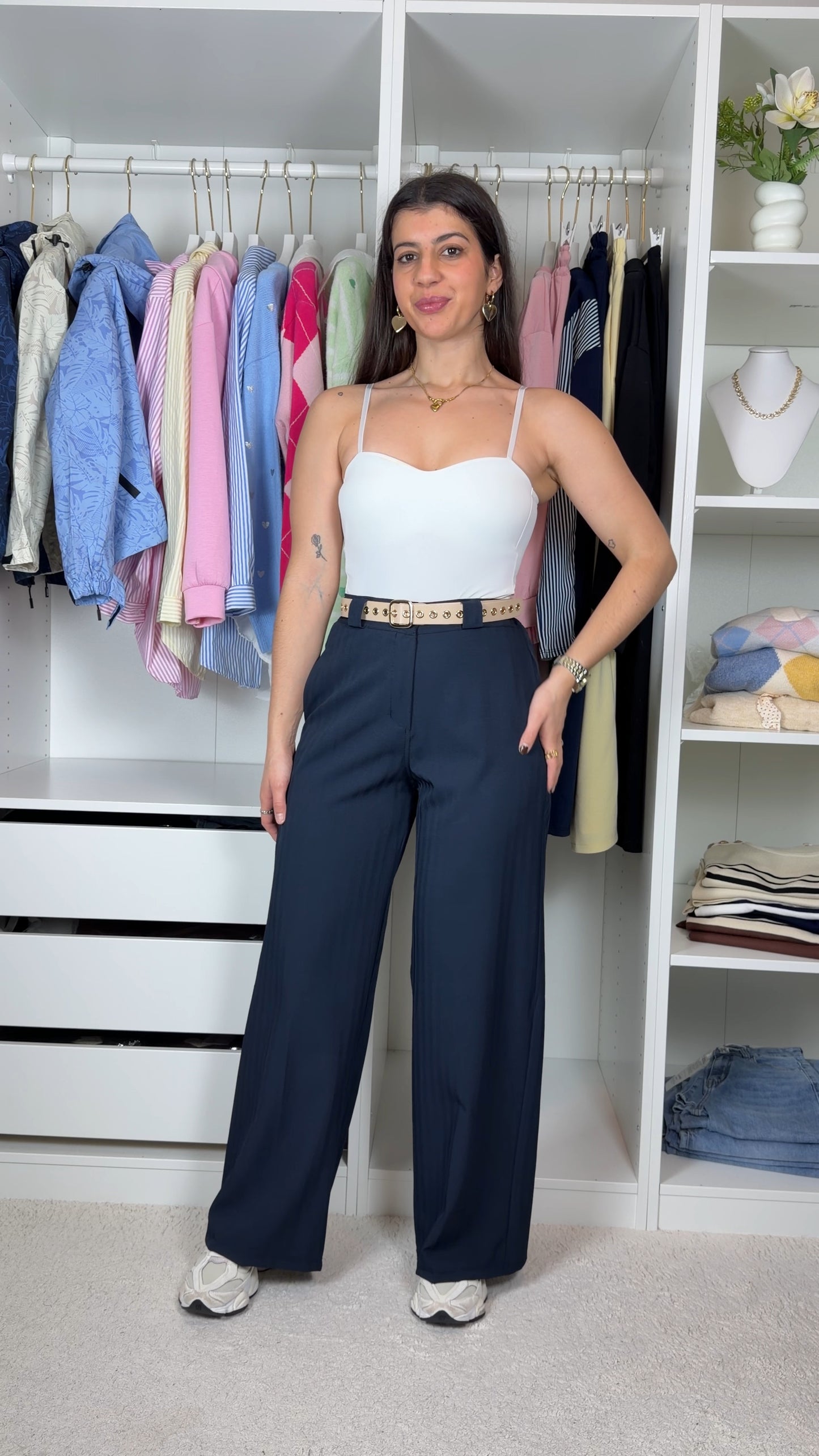 Calças com cinto com tecido texturado