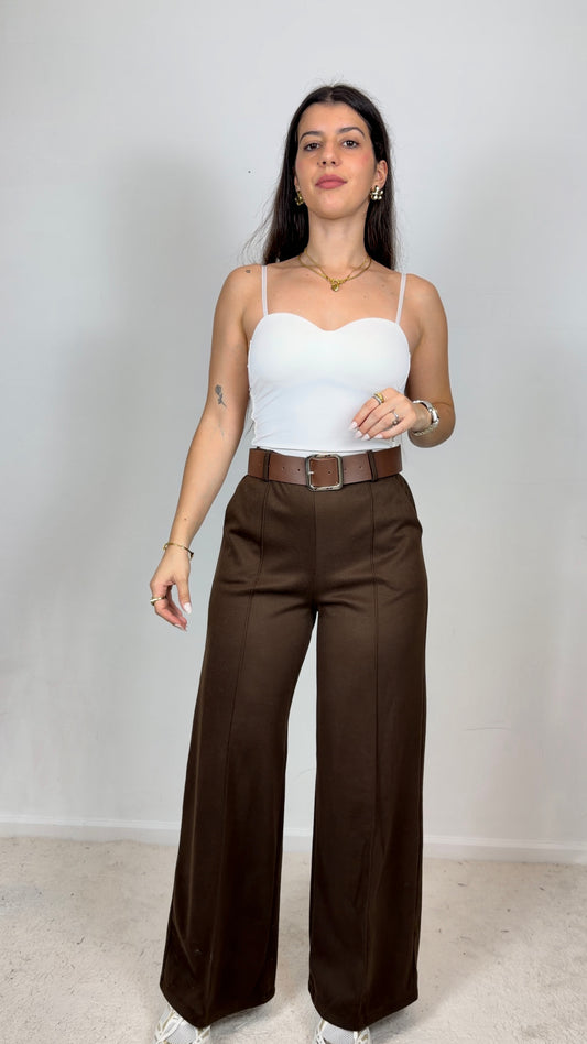 Calças em fazenda macia