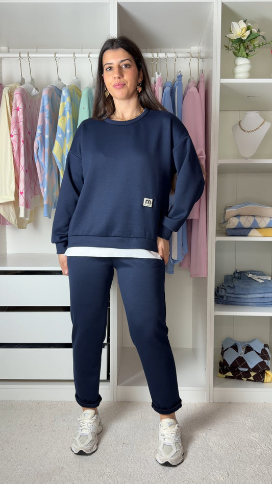 Conjunto fato de treino