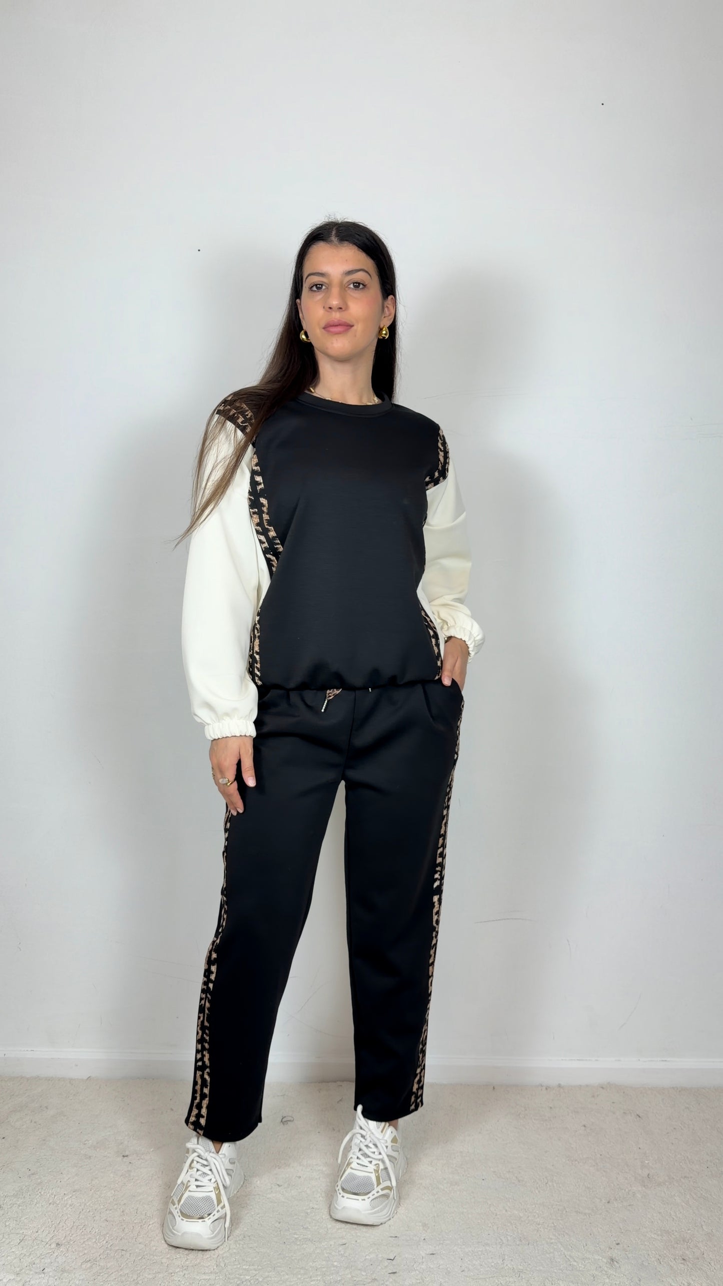 Conjunto fato de treino