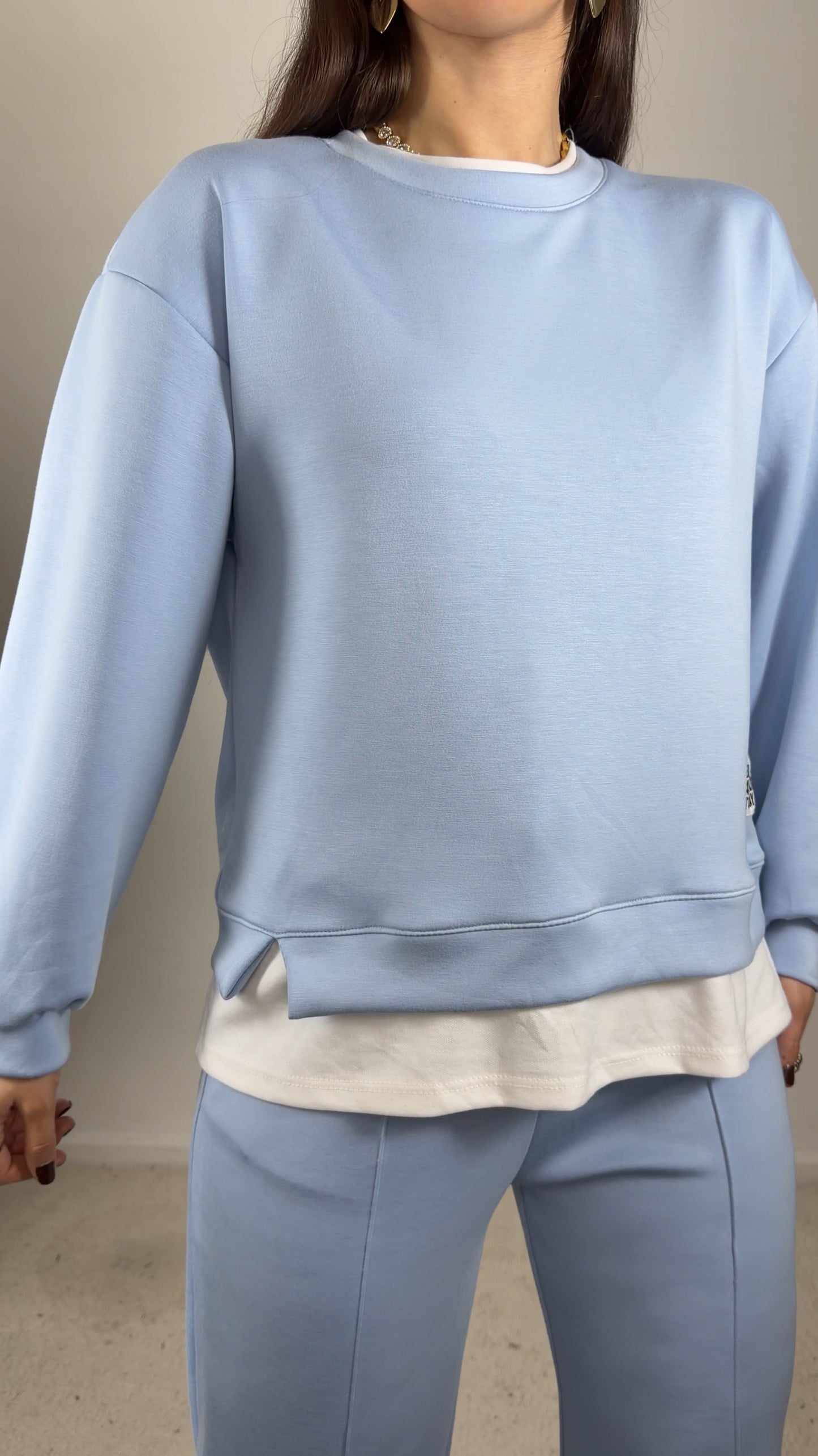 Conjunto fato de treino