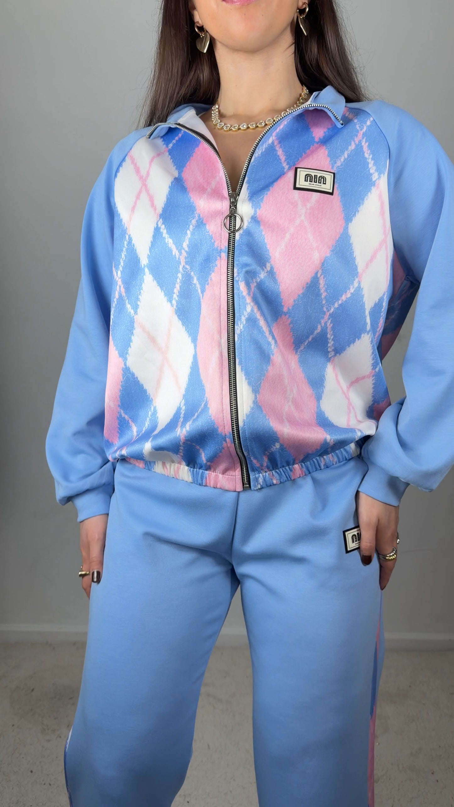 Conjunto fato de treino c/padrão de losangos