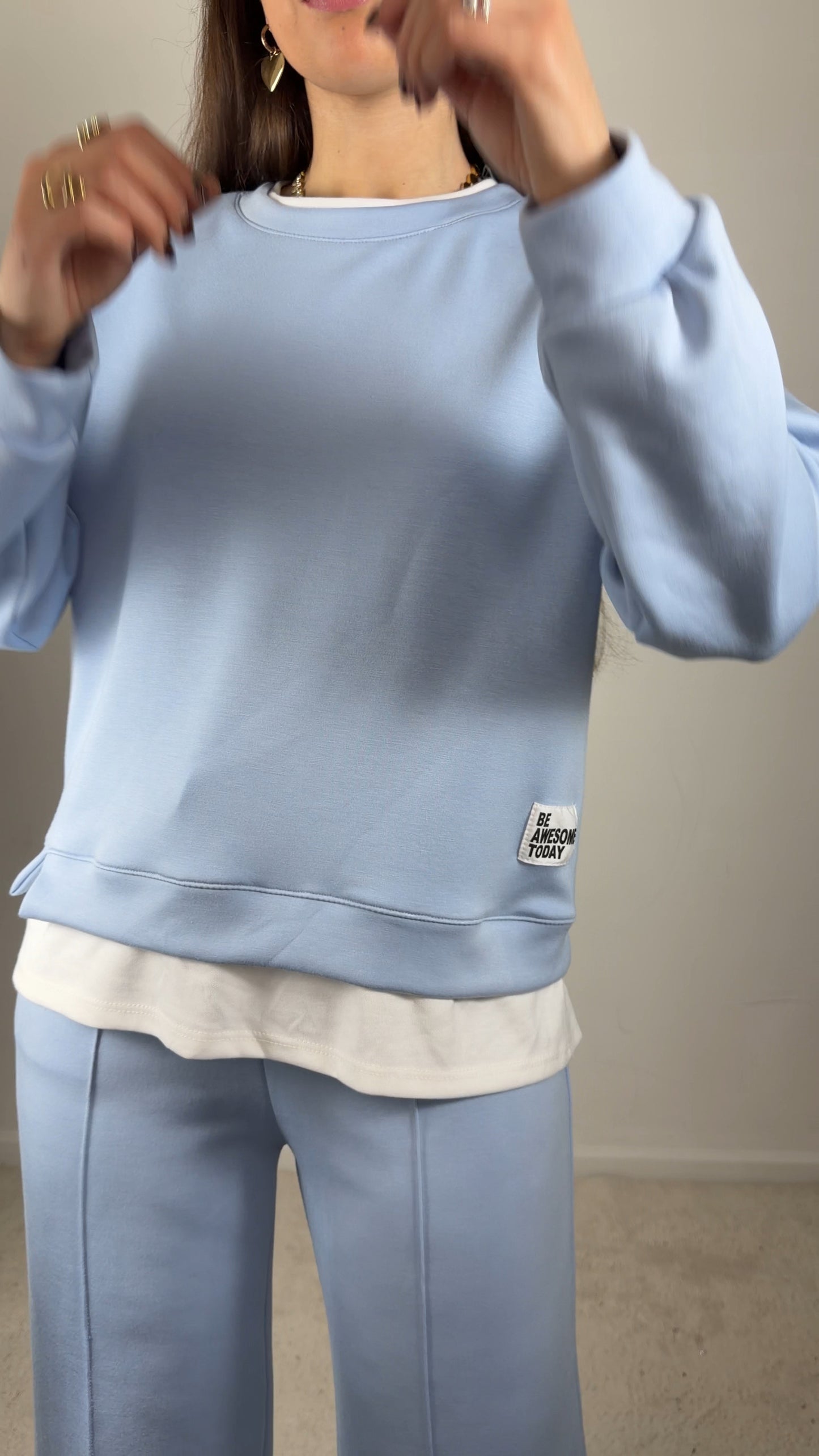 Conjunto fato de treino